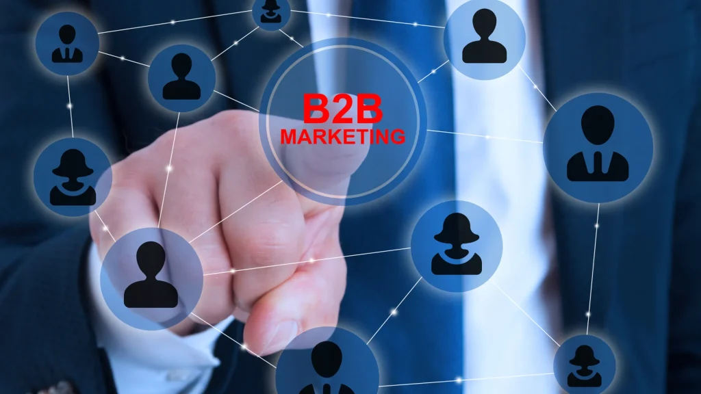 Businessman interacting with a B2B marketing network, emphasizing digital connections and B2B digital marketing strategies.